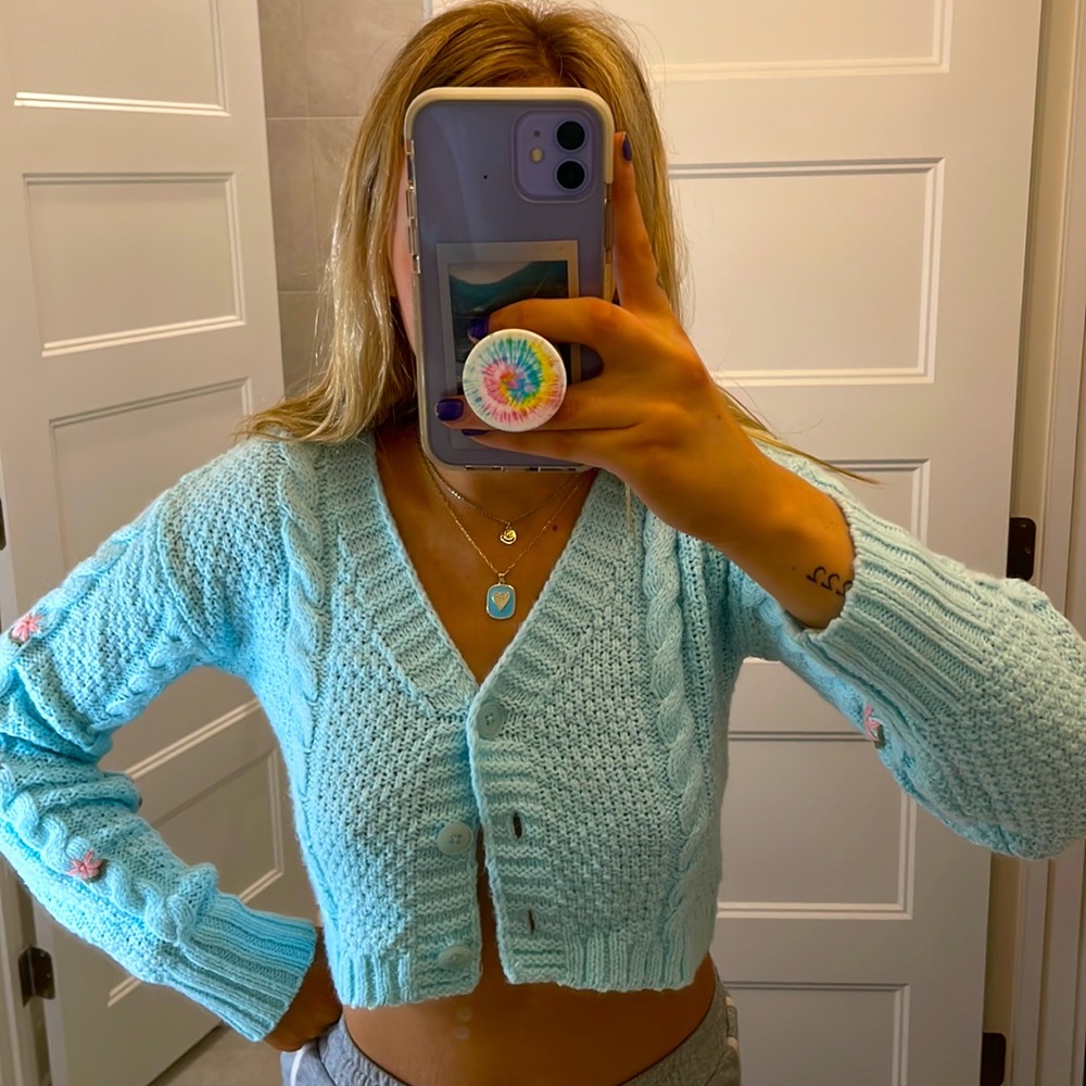 Cropped blue v neck sweater